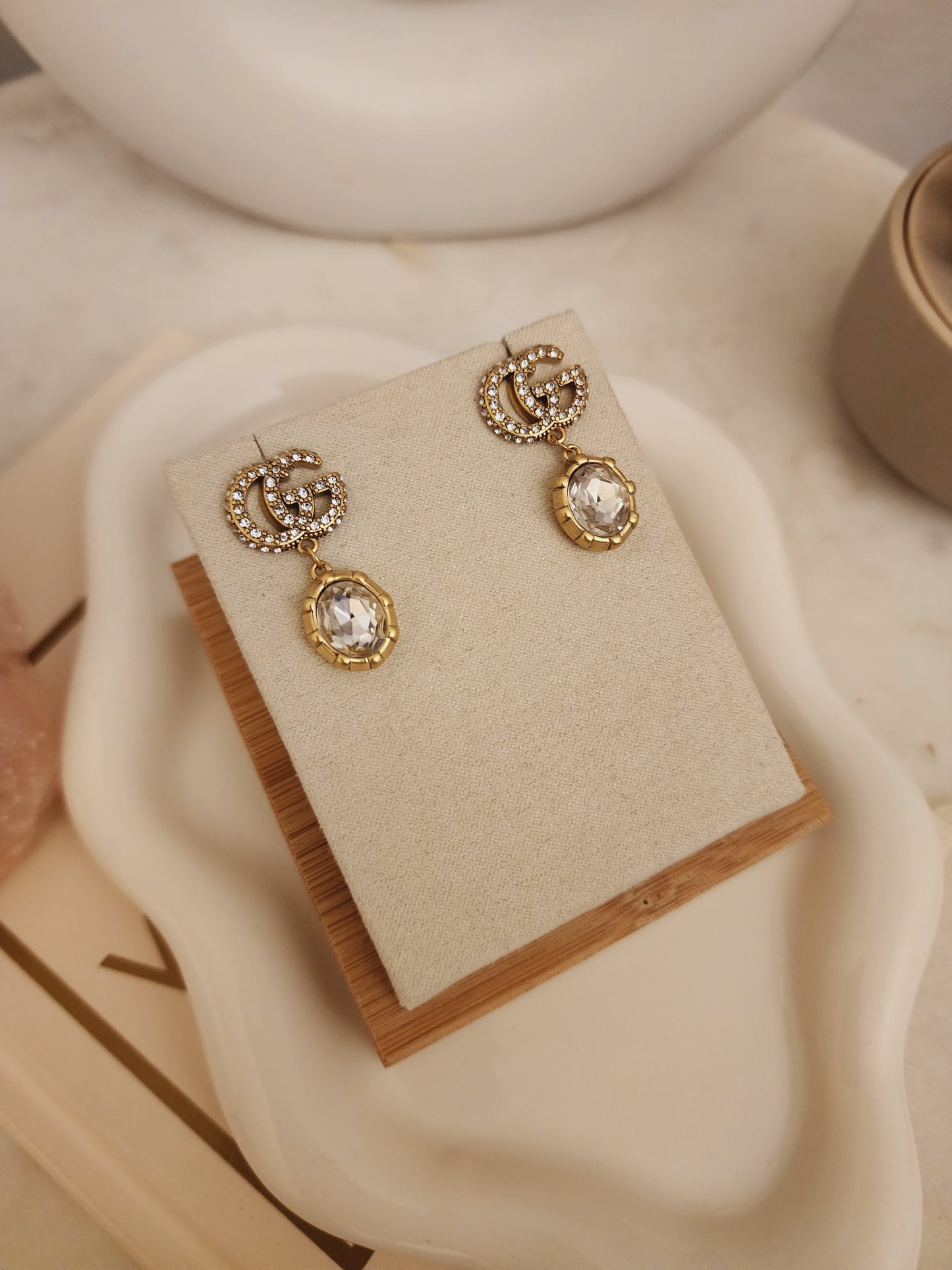 Guzzi crystal Gold tone earrings